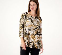 An eye-catching print, a flattering A-line silhouette, and shirring along the sleeves -- what's not to love about this beautiful blouse? Plus, the Liquid Knit® feels oh-so soft and comfy on your skin. From Susan Graver. Spring Stretch Tops With Abstract Print, Patterned Floral Print Tops For Fall, Floral Print Patterned Tops For Fall, Fall Printed Tops With 3/4 Sleeves, Patterned Printed Tops For Fall, Casual Stretch Top With Abstract Print, Patterned Relaxed Fit Top For Fall, Casual Stretch Tops With Abstract Print, Relaxed Fit Patterned Tops For Fall