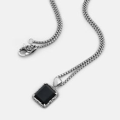 "Rebirth" Sterling Silver Men's Necklace – Clocks and Colours Black Sterling Silver Jewelry With Rectangular Stone, Black Sterling Silver Rectangular Jewelry, Classic Black Jewelry With Oxidized Finish, Black Engraved Rectangular Pendant Jewelry, Silver Rectangular Onyx Jewelry, Silver Onyx Rectangular Jewelry, Rectangular Silver Onyx Jewelry, Black Rectangular Engraved Jewelry, Black Engraved Rectangular Jewelry