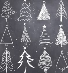 christmas trees drawn in chalk on a blackboard