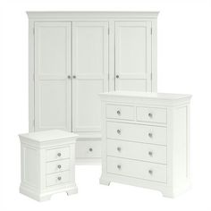 a white bedroom furniture set with drawers and dresser