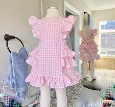 This darling all cotton pink gingham pinafore dress offers loads of ruffles in Carolina Gingham fabric from Robert Kaufman so it's premium cotton and breathable to feel great in the summertime. As is custom with Playful Princess items, the design has our signature flexible fit without fasteners and zippers that may break over time. Adjustable straps loop through the back to tie in a sweet bow. Throw it on over a shirt for a vintage pinafore look during any season. Princess Items, Vintage Pinafore, In The Summertime, Gingham Fabric, Check Dress, Pink Gingham, Robert Kaufman, Pinafore Dress, Thrift Store Finds