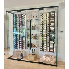 a display case filled with lots of wine bottles