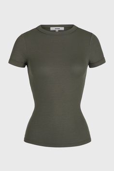 Fitted tee with a crew neckline. Feel a subtle pop of texture in this tight-knit ribbed fabric. It's stretchy, comfortable and forms perfectly to your body. Color: Mineral Rib Sizing: X/S (0-2), S/M (4-6), M/L (8-10) Model is 5'8" and is wearing size X/S Fabric: 95% Ribbed Rayon, 5% Spandex Care: Machine Wash Cold With Like Colors.Care: Lay Flat to Dry. JOAH BROWN | MADE IN LOS ANGELES Form Fitting Tops, Joah Brown, Black Friday Promotions, Fitted Tee, Body Color, Mustard Seed, Newfoundland, Goat Milk, Ribbed Fabric