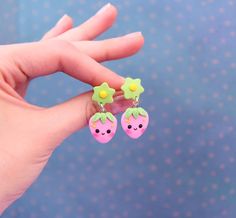 Funny handmade kawaii strawberry dangle earrings made by me of Polymer Clay. No matter how old are you, it can be funny gift for everyone (: Approximate dimensions: Length: 3.5cm  (  1.4"  ) Width:   1.5cm  (  0.6"  ) -Jewelry packed in little brown crafts box (: -All my jewelry are completely handmade so it can be slightly different than shown on the pictures. -Notice. Polymer clay love water but metal parts are not waterproof, so please avoid direct contact with water (like swimming or bathing Cute Fruit Design Earrings For Gift, Cute Strawberry Print Earrings For Gifts, Cute Handmade Drop Flower Earrings, Handmade Cute Flower Drop Earrings, Pink Fun Flower Earrings For Gift, Fun Pink Flower Earrings For Gift, Fun Pink Flower Earrings As Gift, Handmade Green Kawaii Earrings, Cute Handmade Dangle Flower Earrings