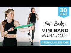 a woman holding a resistance band while standing in front of a wall with the words full body mini band workout