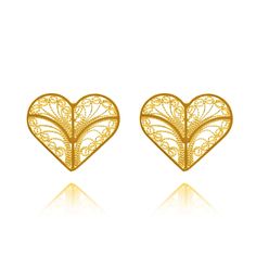 Lightweight and lovely. The style and timeless appeal of these Kylie Hearts Studs Earrings are stunning. Evoking the elegance from a time that speaks of tradition and sophistication, these earrings are a sensational and versatile choice if you are looking for a tasteful accessory. They will add the perfect touch to any special occasion that calls for a chic and classy look. Features: For pierced ears Handmade Sterling silver 970 Fine filigree technique Dimensions whole earrings from the top-bott Yellow Gold Plated Plug Earrings For Wedding, Gold Heart Shaped Clip-on Earrings For Wedding, 22k Gold Anniversary Earrings, Traditional Heart Jewelry For Wedding, Traditional Heart-shaped Jewelry For Weddings, Traditional Heart-shaped Wedding Jewelry, Elegant Gold Heart-shaped Clip-on Earrings, Elegant Gold Heart Shaped Clip-on Earrings, Elegant Gold Plated Heart Earrings As Gift