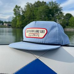 Expertly crafted: SLL PATCH SKY BLUE ROPE HAT is a durable and comfortable cotton/poly blend with a plastic snapback for an adjustable fit. With UPF 50+ and water repellent properties, this hat protects from the sun and water while showcasing the OG SLL PATCH design.   * Cotton/Poly Blend *  Plastic Snapback * UPF 50+ * Water Repellent Blue Cotton Sun Hat For Outdoor Use, Blue Cotton Sun Hat For Outdoor, Casual Blue Snapback Hat For Travel, Blue Trucker Snapback Hat For Beach, Blue Cap-shaped Sun Hat For Outdoor, Blue Sun Hat Cap For Outdoor Activities, Blue Snapback Hat For Summer Outdoor Activities, Blue Cotton Trucker Snapback Hat, Blue Curved Brim Sun Hat For Outdoor Activities