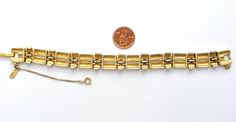 Designer Signed Fashion Jewelry - This is a well made vintage gold tone bracelet by Monet. It is 7.5" long, .63" wide, has safety chain, signed Monet on clasp and on hanging tag, great condition with slight wear on the inside. Vintage Monet, Safety Chain, Hang Tags, A Well, Vintage Gold, Gold Bracelet, Gold Tones, Fashion Jewelry, Bracelet