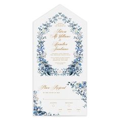 a wedding card with blue flowers and greenery