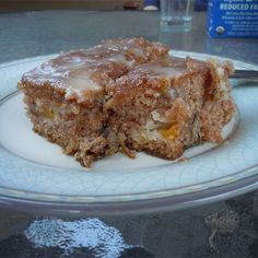 a piece of cake sitting on top of a white plate