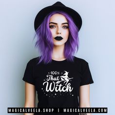 A Magical Black Witchy T-Shirt! Soft, light cotton, quality black t-shirt reads "100% That Witch". White printed design includes a witch on a broom with a cat. This comfy, contoured 100% cotton tee offers a semi-fitted silhouette and is pre-shrunk to ensure lastability. It features cap sleeves and a taped neck and shoulders. Perfect for yoga, pagan pride festivals, witchy beach days, or any time you want to feel like a Witchy Woman. 🖤 🌙 𝐓𝐡𝐢𝐬 𝐝𝐞𝐬𝐢𝐠𝐧 𝐚𝐥𝐬𝐨 𝐚𝐯𝐚𝐢𝐥𝐚𝐛𝐥𝐞 𝐨𝐧 𝐓 Black Slogan T-shirt For Halloween, Witchy Short Sleeve Cotton Tops, Witchy Cotton Short Sleeve Tops, Black Witchy Tops With Letter Print, Cotton Short Sleeve Witchy T-shirt, Witchy Short Sleeve Cotton T-shirt, Witchy Cotton Short Sleeve T-shirt, Cotton Witchy Short Sleeve T-shirt, Witchy Cotton Tops With Letter Print