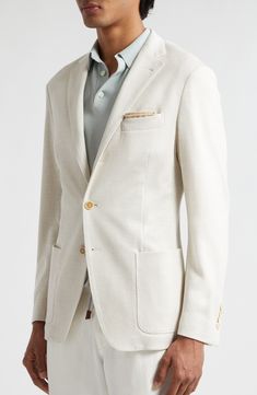 Linen brings the texture and cotton adds the softness to this three-button sport coat with pickstitching trimming every edge. Three-button closure Notched lapels Chest welt pocket; front patch pockets 54% linen, 46% cotton Dry clean Made in Italy Designer Clothing Formal Unstructured Sport Coat With Pockets, Unstructured Formal Sport Coat With Pockets, Timeless Sport Coat With Lapel Collar And Patch Pockets, Timeless Sport Coat With Patch Pockets, Formal Unstructured Single Breasted Sport Coat, Luxury Spring Sport Coat With Welt Pockets, Cream Blazer With Notch Lapel And Pockets, Designer Tailored Blazer With Patch Pockets, Cream Notch Lapel Blazer With Pockets