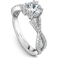 a white gold engagement ring with diamonds on the side