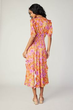 Done in a grand floral print, this midi dress is perfect for sun-drenched strolls through the countryside or your favorite city park. It has daintily detailed ruffles on the shoulders and skirt, plus its got slightly structured shoulders for a defined shape. •Split neckline •Relaxed fit •Lightly ruffled shoulders •Ruffled skirt DIMENSIONS •Standard: 49" Length Item number 249007650% Polyester 50% Recycled Polyester Hand wash cold Digitally printed Digital Printing minimizes water consumption and Summer Garden Party Midi Dress With Ruffles, Summer Knee-length Floral Dress With Ruffles, Spring Floral Midi Dress With Ruched Detail, Spring Vacation Midi Dress With Ruffled Skirt, Summer Midi Dress With Ruffles For Garden Party, Summer Vacation Midi Dress With Ruffled Skirt, Summer Midi Dress With Ruffled Skirt For Vacation, Knee-length Ruffled Floral Dress For Summer, Knee-length Floral Dress With Ruffles For Summer