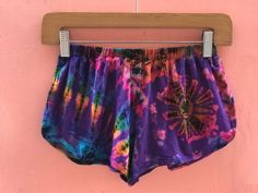 "-95% rayon & 5% spandex -Made in Thailand -Waist:24\"-38\" -Length: 8\" -Fits S/M/L Matching crop top available Please visit our shop at https://www.etsy.com/listing/703630347/tie-dye-crop-top-festival-top-spandex?ref=related-2&pro=1&frs=1" Rave Style Festival Bottoms, Short Cut, Rave Style Short Festival Bottoms, Summer Purple Athletic Shorts With Built-in Shorts, Stretch Festival Bottoms, Fitted Cotton Shorts For Festivals, Fitted Shorts For Summer Music Festival, Bohemian Stretch Shorts For Festivals, Bohemian Stretch Festival Shorts, Stretch Rave Shorts For Music Festival