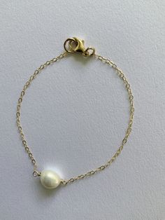 Against the Grain Pearl Bracelet – Few Made Delicate Pearl Chain Bracelet With Pearl Charm, Everyday Pearl Bracelet With Pearl Charm, Classic Pearl Charm Chain Bracelet As Gift, Classic Chain Bracelet With Pearl Charm As Gift, Dainty Pearl Drop Chain Bracelet For Everyday, Dainty Everyday Chain Bracelet With Pearl Drop, Everyday Pearl Charm Bracelet, Dainty Everyday Pearl Drop Chain Bracelet, White Chain Bracelet With Pearl Drop As Gift