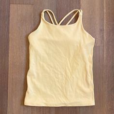 Brand New W/O Tag Pretty Yellow Pale Sporty Snug Fit Top For Yoga, Stretch Racerback Tops For Sports, Sporty Snug Fit Top For Workout, Sporty Snug Fit Yoga Tops, Sporty Snug Fit Workout Top, Spring Gym T-shirt With Stretch, Cotton Athleisure Training Top, Cotton Athleisure Tops For Training, Sporty Snug Fit Tops For Gym