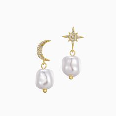 Channel the laid-back elegance of Malibu, California with the Aster Mismatched Stud Earrings. These minimalistic gold earrings feature a celestial-inspired design, combining a sparkling star and moon with delicate freshwater pearl accents. Perfect for adding a whimsical yet chic touch to any outfit, these dainty studs embody the effortlessly sophisticated vibe of everyday gold earrings. Crafted from 18k gold plated sterling brass, they are lightweight, hypoallergenic, and built to last. As a thoughtful gift, the Aster Stud Earrings are ideal for celebrating any occasion. Affordable yet luxurious, their timeless design makes them the perfect choice for anyone who appreciates dainty gold jewelry that complements both casual and formal looks. Features: - Unique mismatched gold stud earrings f Everyday Gold Earrings, Star And Moon Earrings, Moon Stud Earrings, Celestial Magic, Dainty Gold Jewelry, Gold Earrings For Women, Star And Moon, 18k Gold Earrings, Sparkling Stars