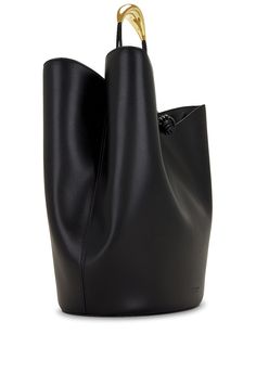 Find BOTTEGA VENETA Medium Double Clam Bucket Urban Leather on Editorialist. Bottega Veneta Medium Double Clam Bucket Urban Leather in Black Leather exterior and interior. Made in Italy. Dual top toggle closures. Dual main compartments with center divider. Leather shoulder strap with knotted detailing and gold-tone hardware. Measures approx 17.5 W x 14 H x 8 D Shoulder strap with a 8 drop. BOTT-MY167. 743598-VB1K5-1019. About the designer: Bottega Veneta – inspiring individuality with innovative craftmanship since 1966. Creativity lies at the heart of all that we do. Born in Vicenza the house is rooted in Italian culture yet maintains a truly global outlook. An inclusive brand with exclusive products Bottega Veneta is as much of a feeling as it is an aesthetic. Everyday Leather Shoulder Bag With Loop Closure, Modern Calf Leather Bucket Bag For Business, Luxury Leather Bucket Bag With Metal Hardware, Leather Bucket Bag For Evening, Evening Calf Leather Bucket Bag, Calf Leather Bucket Bag For Evening, Elegant Calf Leather Bucket Bag For Evening, Modern Bucket Bag With Gold-tone Hardware In Calf Leather, Designer Bucket Bag With Metal Hardware