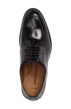 A slightly exaggerated profile emboldens a minimalist oxford crafted of polished fine-grain leather and welted onto a sturdy sole. Lace-up style Leather upper, lining and sole Imported Men's Shoes Leather Oxford Shoes With Almond Toe For Derby, Classic Pointed Toe Lace-up Calf Leather Shoes, Classic Pointed Toe Calf Leather Lace-up Shoes, Classic Oxford Lace-up Shoes For Business, Classic Leather Oxford With Rubber Sole, Classic Lace-up Shoes With Pointed Toe And Rubber Sole, Classic Leather Oxford Shoes With Rubber Sole, Classic Goodyear Welted Lace-up Shoes For Business Casual, Almond Toe Oxfords With Leather Lining For Work