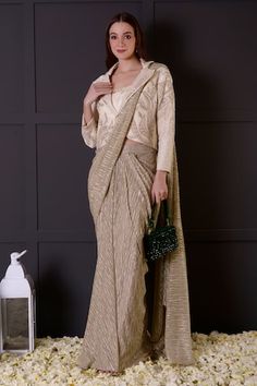 Gold pre-draped saree in imported shimmer base. Comes with an ivory bamberg silk blouse with leaf and pearls hand embroidered neckline and a jacket. - Aza Fashions Designer Silk Draped Saree, Traditional Dupatta With Draped Sleeves For Reception, Designer Silk Pre-draped Saree With Draped Sleeves, Silk Designer Wear Draped Dupatta, Silk Dupatta For Designer Wear, Designer Traditional Wear With Draped Dupatta, Designer Silk Draped Dupatta, Semi-stitched Draped Lehenga For Eid, Draped Blouse With Zari Work For Wedding