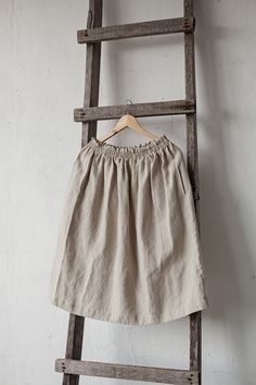 Below the knee skirt is made from 100% soft and washed linen. This Petticoat is perfect for wearing under dress or other skirt or can be worn alone. Match it with our tunics! Details: - Composition: 100% Oeko-Tex certified linen - Colour: natural - Elastic waist - Pockets - Size: One size/fits all - Medium weight linen - Linen care: machine wash gentle; tumble dry low, ironing optional - The price is for one skirt, other pictured items are not included Spring Linen Mini Skirt In Relaxed Fit, Relaxed Linen Mini Skirt For Spring, Linen Mini Skirt For Summer, Summer Linen Mini Skirt Lined, Summer Linen Mini Skirt With Lining, Linen Mini Skirt With Relaxed Fit For Spring, Summer Mini Linen Skirt, Spring Linen Gathered Skirt, Linen Flowy Skirt With Lining