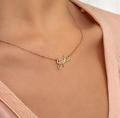 "❤ ❤ Tiny Gold Name Necklace ❤The material is 925 sterling silver. ❤ The pendant size is 3 cm-3.5 cm ❤Packing in a beautiful gift box ❤ Our production time is 2-3 working days ❤ Delivery days: * Domestic delivery days: 5-9 working days * Oversea: 8-12 working days ❤ Please be sure your customized content in \"personalized box\" when check out ❤ If you have any question, contact us freely ❤ Hope you will like the item and our shop" Dainty Name Necklace For Mom, Mother's Day Personalized Gift Necklace With Delicate Chain, Simple Name Necklace With Delicate Chain For Gift, Simple Name Necklace With Delicate Chain As Gift, Simple Custom Name Necklace As Gift, Simple Personalized Name Necklaces, Dainty Charm Necklaces With Names, Rose Gold Name Necklaces, Everyday Name Necklaces For Mother's Day