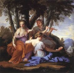 an image of three women sitting in the woods with one woman pointing to something on her finger