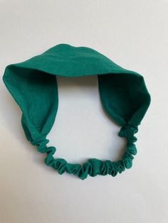 "Emerald green linen headband to keep your hair out of your face while at the gym or use as part of your beauty routine. 100% linen from Lithuania. Gorgeous fabric with dense weaving, durable, medium weight, washed and softened. Great for short or long hair..  Fabric covers the 6.5\"  elastic that comfortably fits behind the head.  Widest width is 6.25\" and tapers down to 1.5\".  Measures approximately 21\" around not stretched - will easily fit up to 23\". Makes a great inexpensive gift. Machi Lululemon Mat, Linen Headband, Bandana Head Scarf, Short Or Long Hair, Hair Bandana, Save Mother Earth, Lavender Sachets, Bandana Hairstyles, Inexpensive Gift