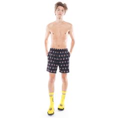 This Cult swim short is crafted from a lightweight, quick-drying polyester . These are the best swim trunks with a mesh lining pockets and rubber tipped drawstrings at the waist for a comfortable fit. This swim short features a allover printed Cult graphic. -100% Polyester -Regular swim short fit Black Swim Trunks With Built-in Shorts For Beachwear, Casual Black Swim Trunks For Beach Season, Black Nylon Shorts For Beach Season, Casual Short Swim Trunks For Swimming, Black Sporty Swim Trunks For Vacation, Black Summer Shorts For Poolside, Black Swimwear With Elastic Waistband For Poolside, Sporty Black Swim Trunks For Vacation, Black Short Swimwear