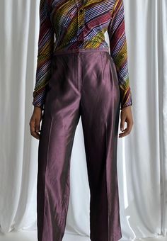 Vintage acetate pants in a beautiful dark purple color. Features front pleats, front button and zip opening, no pockets and straight legs. Size on tag : 12 (pinned on model) MEASUREMENTS: Waist: 32" Hips: 22" Length: 39" MATERIAL: 100% acetate Elegant Wide-leg Purple Pants, Elegant Wide Leg Purple Pants, Chic Purple Evening Bottoms, Elegant High-waisted Purple Pants, Elegant Purple Pants For Party, Elegant Purple Straight Leg Bottoms, Elegant Purple Pants, Purple Straight Pants For Formal Occasions, Formal Purple Straight Pants