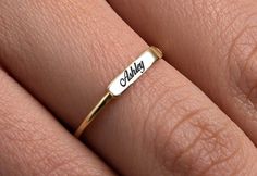 This Simple Name Ring is 14k Solid GOLD ( not filled or plated) You can customize this name ring with the name/word/date/mantra of your choice. Gold Name Ring is the best jewelry you could ever find. This will be the best gift for you and your loved one. All our gold/silver rings are suitable for Nameplate Engraved Ring For Gift, Customizable Nameplate Rings As Gifts, Customizable Nameplate Rings For Gifts, Custom Gold Engraved Personalized Ring, Gold Nameplate Engraved Ring As Gift, White Engraved Ring For Promise With Name, Customized Gold Engraved Ring As Gift, Customizable Gold Engraved Ring For Personalized Gift, Customized Gold Engraved Ring For Gift