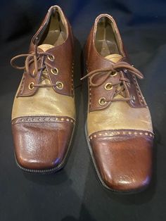 Here is a Vintage 2-Tone pair of saddle shoes, these shoes are a lace up they have a saddle shoe look but but also be worn as Brogues and a cap toe at the front ,They are a great vintage look for day or night. Label  -  PEDWIN SIZE  -  8  ( stated inside the shoe ) Condition :  Good Vintage condition have a scuff at the front and the leather has detached a tiny bit Please check all pictures carefully as they make up part of the description and these are  a original pair of vintage shoes We ship Saddle Shoe, Saddle Shoes, Mens Vintage, Look Vintage, Mens Oxfords, Looks Vintage, Vintage Shoes, Vintage Look, Vintage Looks