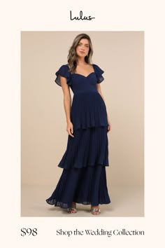 a woman in a blue dress with the words shop the wedding collection