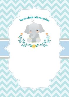 a baby elephant is sitting on top of a blue and white chevron background