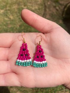 These seed bead earrings are the perfect addition to any outfit! Handmade in TX, these earrings are great for anyone who loves the taste of sweet summertime. Fuchsia & teal add a twist on traditional watermelon colors. Adjustable Beaded Earrings For Vacation, Colorful Beads Earrings For Summer Vacation, Handmade Beaded Earrings For Beach In Summer, Summer Beaded Earrings With Tiny Beads, Casual Handmade Beaded Dangle Earrings, Casual Handmade Beaded Earrings For Summer, Multicolor Beaded Earrings For Summer Vacation, Multicolor Beaded Earrings For Summer Beach, Handmade Beaded Drop Earrings For Vacation