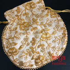 Jaipuri Satin Potli Designer Bag/ Traditional Embroidered Potli / Haldi Mayun Gift/ Wedding Bags For Women/ Embroidered Clutch Purse/ Potli Bag/ Velvet Wedding Favor BagsDescription:Made in Colorful satin Cloth with Golden Hand EmbroiderySize -: Length- 23cm , width- 22 cm or Approx. 9X9"Material -: Satin, BeadsBest Gift item for Mehendi/ Mayun/ Haldi/Wedding Function.Used to carry earrings, rings, bracelets, and other jewelry items. Other usages as storage for necklaces, bangles, and other acce Traditional Embroidered Potli Bag For Ceremonies, Traditional Potli Bag With Gold Embroidery For Gifts, Wedding Multicolor Embroidered Potli Bag, Festive Gold Potli Bag With Intricate Embroidery, Traditional Embroidered Ceremonial Potli Bag, Embroidered Clutch Purse, Embroidered Clutch, Potli Bags, Wedding Bag