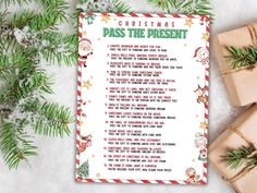 a christmas pass the present poem with presents around it on top of snow covered ground