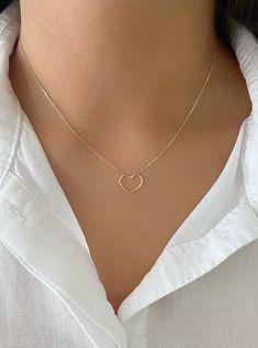 "Minimalist Dainty 14K Yellow Gold Open Heart Charm Necklace. Necklace Is Adjustable From 18\" To 16\" Inch. Perfect For Everyday Wear. Treat Yourself Or Someone Special To This Beautiful Necklace. Perfect For Layering. Chain Is A High Quality Box Chain That Feels Like Silk. Jewelry Comes In A Cute Jewelry Box Ready To Present. Model Is Wearing A 16\" Inch Chain. -All Jewelry Is New And Inspected For Quality Assurance. -jewelry Is Crafted In Genuine High Quality 14K Gold. -We Do Not Sell Gold Pl Small Chains Gold With Pendant, Elegant 14k Gold Filled Heart Necklace, Minimalist 14k Gold-filled Jewelry With Heart Charm, Minimalist Everyday Heart Necklace With Adjustable Chain, Minimalist 14k Gold Filled Open Heart Jewelry, Everyday 14k Gold Open Heart Charm Necklace, Everyday 14k Rose Gold Heart Necklace, Everyday Rose Gold 14k Heart Necklace, Dainty 14k Gold-filled Yellow Gold Heart Necklace