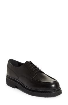 Crafted in Portugal from grained calfskin leather, this handsewn apron-toe derby with a lightweight crepe sole is the perfect go-to for active days. Lace-up style Leather upper and lining/synthetic sole Made in Portugal Men's Designer Shoes