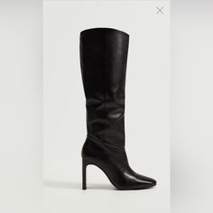 100% Leather. Tall Leg. Rounded Toe. Rectangular Heel. Inner Lining. 3.94 In Heel. Chic Snip Toe Heeled Boots In Faux Leather, Chic Faux Leather Heeled Boots With Snip Toe, Leather Pointed Toe Heeled Boots For Office, Chic Leather Knee-high Boots With Square Toe, Classic Leather Knee-high Boots With High Heel, Classic Faux Leather Heeled Boots For Work, Leather Square Toe Knee-high Boots For Night Out, Chic Leather Snip Toe Heels, Leather Knee-high Square Toe Boots For Night Out