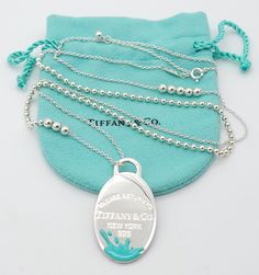 Authentic Tiffany & Co  Necklace  Hallmark (c)Tiffany&Co. AG925  Size  Pendant Height: 1 1/2" in Pendant Width: 3/4" inch Chain Link and Mix Bead Beaded 28"-30" inch Length Composition Material Metal: Sterling Silver Purity: 925 Tiffany&Co. Pouch is Included Ticket Number: 0212 Please Base Your Decision On Provided Images,  We Strive to Take As Best Pictures As Possible All Items Are Well Packaged & Shipped Usually Within Same Day or Next Day.  International Shipping is ONLY available to Qualifi Return To Tiffany Toggle Necklace, Silver Pendant Necklace Tiffany & Co., Tiffany And Co Blue Heart Necklace, Tiffney And Co Jewelry, Tiffany Necklaces, Necklaces Ideas, Tiffany And Co Necklace, Return To Tiffany, Tiffany Necklace