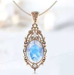 Ornate Oval Pendant Jewelry For Wedding, Ornate Oval Pendant Wedding Jewelry, Intricate Pendant Jewelry For Anniversary, Intricate Design Pendant Jewelry For Anniversary, Fine Jewelry Wedding Necklace With Cabochon, Wedding Fine Jewelry Necklace With Cabochon, White Oval Necklace With Intricate Design, Oval Pendant Necklaces With Cabochon For Wedding, Victorian Gold Jewelry With Moonstone