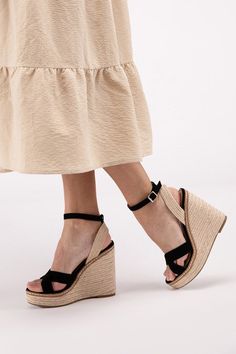 Introducing our Espadrille, the perfect blend of style and comfort for your summer wardrobe. These Criss Cross Ankle Strap Espadrille Platform Wedge Sandals are designed to elevate your look while keeping you comfortable all day long. With their chic criss-cross strap design, they add a touch of elegance to any outfit. The ankle strap provides extra support and security, while the espadrille platform wedge sole adds height and style. Style: Casual Silhouette: Wedge Sandal Embellishment: Criss Cross Length: Ankle Closure: Buckle Heel Height: 5" Width: Regular Material Composition: Suede soleMaterial: Synthetic Care Instructions: Use a soft cloth and a little lukewarm water to clean the footwear after use. If necessary, add a small amount of mild soap. Carefully wipe off soap residue with a Espadrilles Platform, Buckled Heels, Espadrille Sandals, Platform Wedge Sandals, Platform Wedge, Elevate Your Look, Strap Design, Wedge Sandal, Espadrilles Wedges