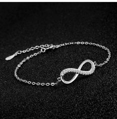 ♥ MATERIAL: 925 sterling silver and cubic zirconia. 925 Sterling Silver is the ideal metal material for making accessories thanks to its proven shine, brightness and strength. ♥ size: bracelet length: 15cm + 4cm (extension), infinity size: 2*1cm, weight: 1.8g. ♥ Infinity Design: Infinity symbol silver bracelet, simple and elegant design. Infinity means infinite love and friendship forever. It is an ideal gift for your good friend, lover or yourself. ♥ Packaging: Packed in a filigree gift box, it Infinity Meaning, Silver Jewelry Bracelet, Friendship Forever, Infinity Design, Bracelet Simple, Infinite Love, Jewelry Bracelets Silver, Love And Friendship, Making Accessories