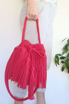 Hand crochet to order crossbody boho bag. Made with strong and durable, but soft cotton rope with fringes around. Choose your favourite color for the bag and lining with two deep pockets! Spring Bohemian Woven Bucket Bag, Spring Bohemian Bucket Bag With Braided Handles, Bohemian Spring Crochet Bucket Bag, Spring Bohemian Bucket Bag, Summer Festival Bucket Shoulder Bag, Bohemian Bucket Bag With Tassels For Beach, Bohemian Bucket Bag With Tassels For Vacation, Casual Summer Crochet Bag With Tassels, Summer Bucket Bag With Tassels For Everyday Use