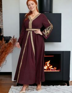 Experience the opulence and grace of our Elegant Maroon Embroidered Dress, intricately embellished with shimmering gold embroidery on the sleeves and front panel. The exquisite Guipure lace detailing adds a touch of sophistication, while the delicately embroidered waist and back tie exude elegance. Made from luxurious 100% polyester, it offers unrivaled comfort and style. Available in sizes 0XL - 4XL (US 12 - 20). **PLEASE NOTE**This item requires our "formal dresses" shipping option due to its Guipure Lace, Gold Embroidery, Lace Panelled, Beautiful Embroidery, Embroidered Dress, Lace Detail, Formal Dresses, Embroidery, Lace