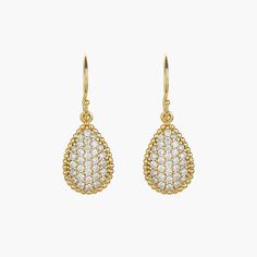 Elevate your elegance with the Leah Crystal Teardrop Earrings, blending chic sophistication with radiant beauty. These exquisite earrings feature shimmering teardrop accents designed to catch the light and enhance any outfit. Ideal for any occasion, they add a touch of timeless glamour with every wear. 18k gold over sterling silver Cubic Zirconia Our gold covering on silver is a thick layer of 18k solid gold on sterling silver meaning it will last longer. You get the look and feel of gold jewelr Elegant Yellow Gold Teardrop Cluster Earrings, Luxury Cubic Zirconia Teardrop Earrings, Elegant Yellow Gold Teardrop Diamond Earrings, Teardrop Pave Jewelry For Evening, Teardrop Pave Setting Evening Jewelry, Glamorous Teardrop Diamond Earrings With Accents, Teardrop Pave Setting Jewelry For Evening, Elegant Teardrop Cluster Earrings For Formal Occasions, Elegant Sparkling Drop Earrings