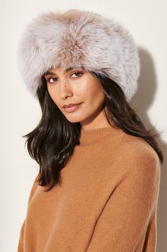 There isn't a more luxurious way to keep warm this winter. Slip on this silky mink hat for a lesson in elegance, and you won't ever take it off. Canadian sheared mink fur adorns the crown, while fluffy Finnish fox fur trim adds volume and pure decadence. The interior is comfy and warm, thanks to a soft, quilted polyester lining. Fur Hat Outfit, Cossack Hat, Hats Cowboy, Mink Coats, Winter Fur Hat, Fur Keychain, Dinner Wear, Fur Hats, Faux Fur Hat