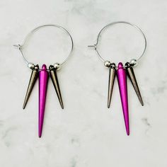 Handmade - Bright Fuchsia Pops Between The Gunmetal Spikes, Create This Edgy Pair Of Earrings. - Spike Beads - Acrylic - Silver Beads, Iron, 4mm - Hoops - Copper, 25mm, Hypoallergenic, Lead And Nickel Free Please Visit And Favorite My Shop: Https://Www.Etsy.Com/Shop/Wanderingbunnyshop Packaged With Care And Sent Straight To Your Door. Keywords: Spike Hoop Earrings, Spike Earrings, Minimalist Earrings, Hoop Earrings, Small Hoop Earrings, Silver Earrings, Goth Earrings, Punk Earrings, Punk Earring Small Hoop Pink Pierced Earrings, Edgy Small Hoop Earrings As Gift, Pink Small Hoop Pierced Earrings, Edgy Adjustable Pink Jewelry, Adjustable Edgy Pink Jewelry, Nickel Free Punk Style Earrings, Adjustable Nickel-free Purple Hoop Earrings, Small Hoop Pink Metal Earrings, Nickel-free Pink Hoop Earrings As Gift